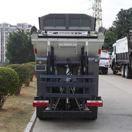 How much weight can an automated garbage truck lift?