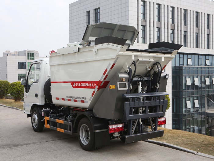 How much weight can an automated garbage truck lift?